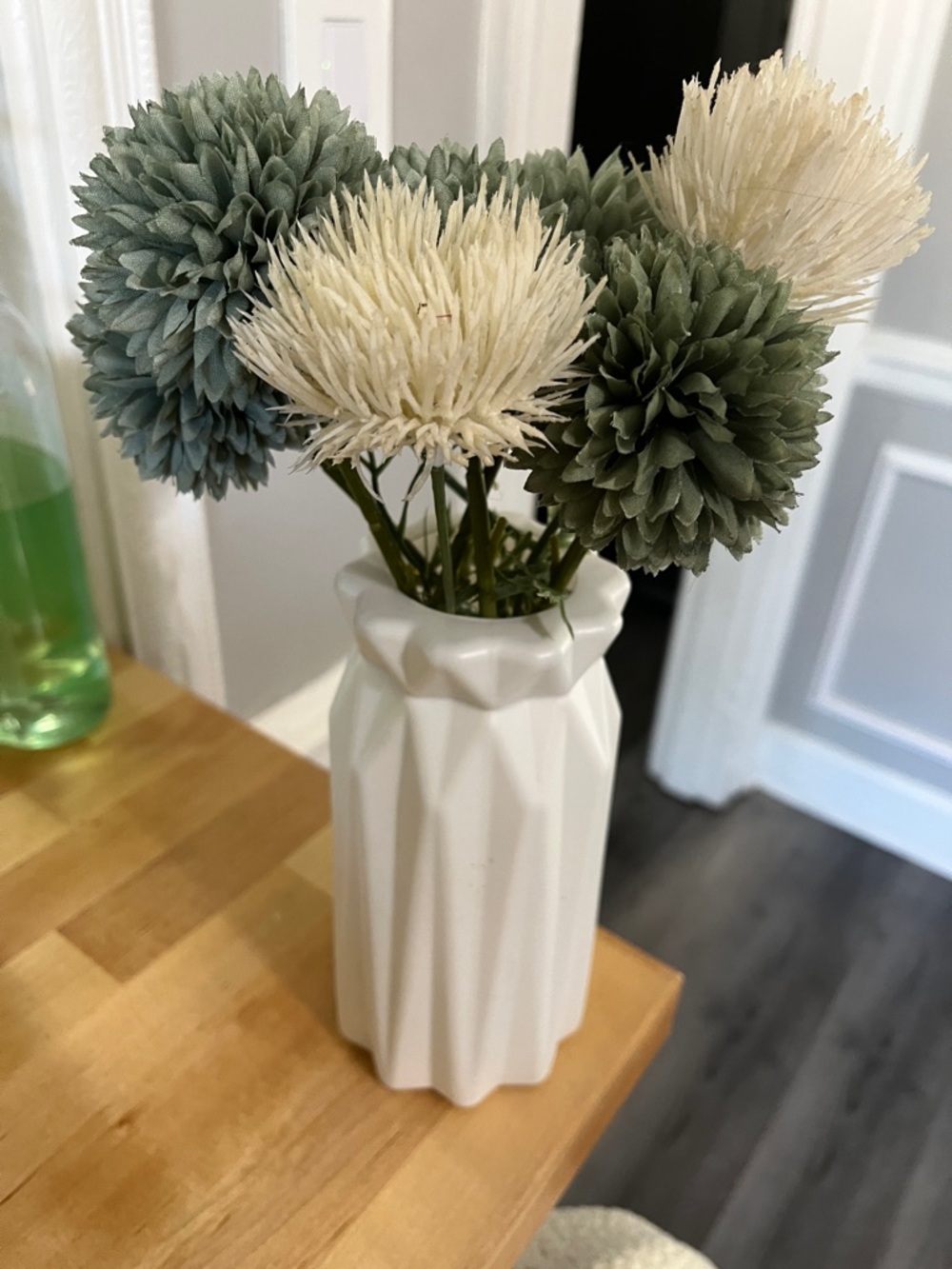 White Faceted Ceramic Vase with Green and Cream Floral Accents